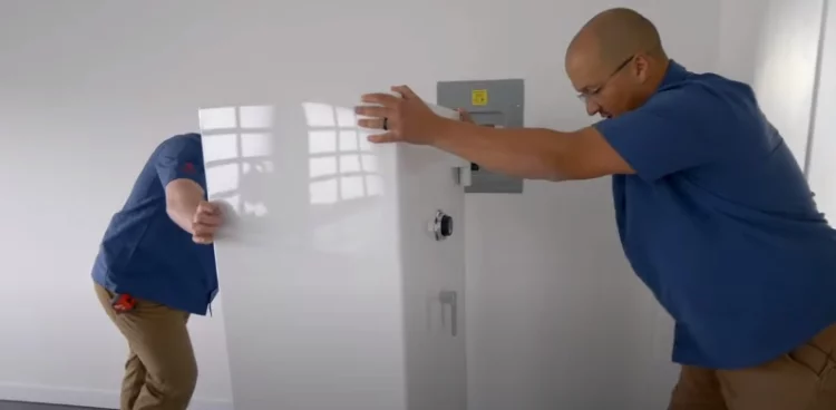 Load the Large Safe onto the Moving Vehicle