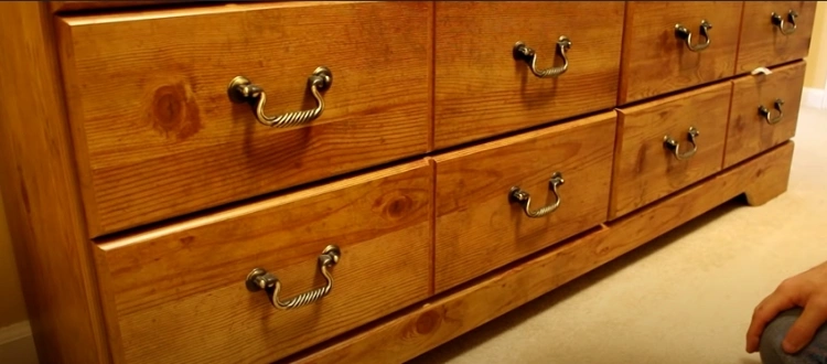 Stash under dresser drawers